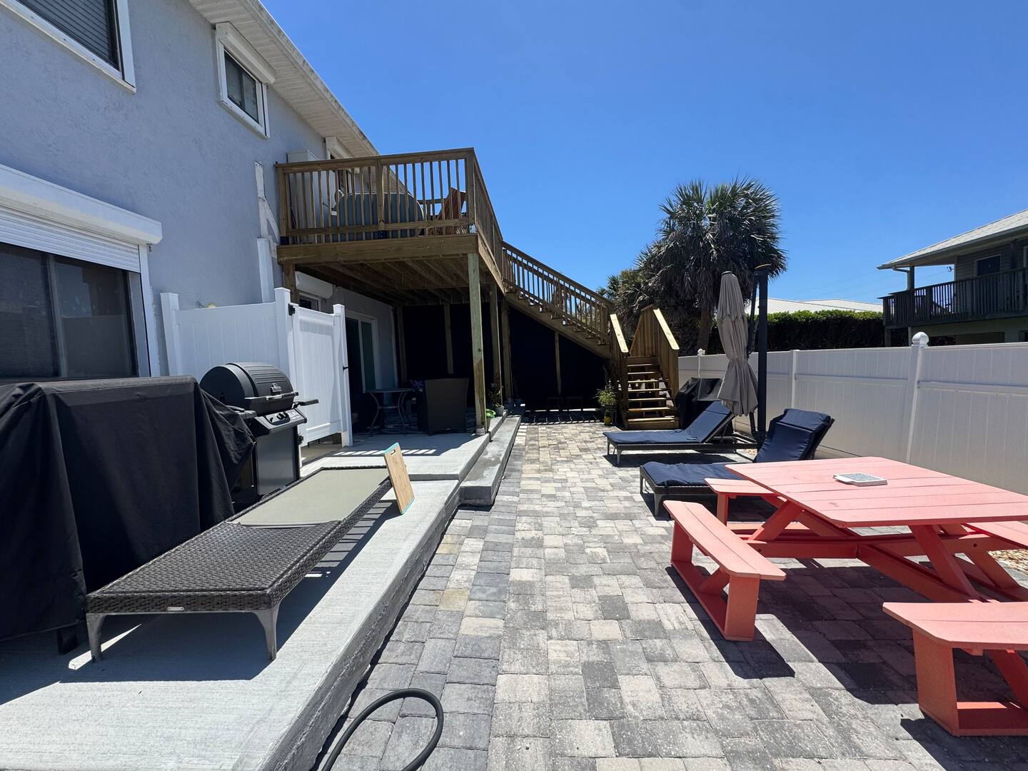 Relaxing Beach Retreat — Patio and grill area