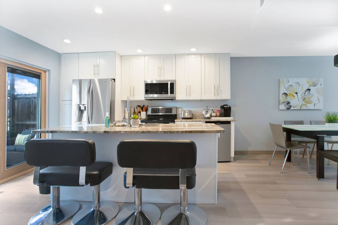 Modern Beach Retreat — Kitchen and dining